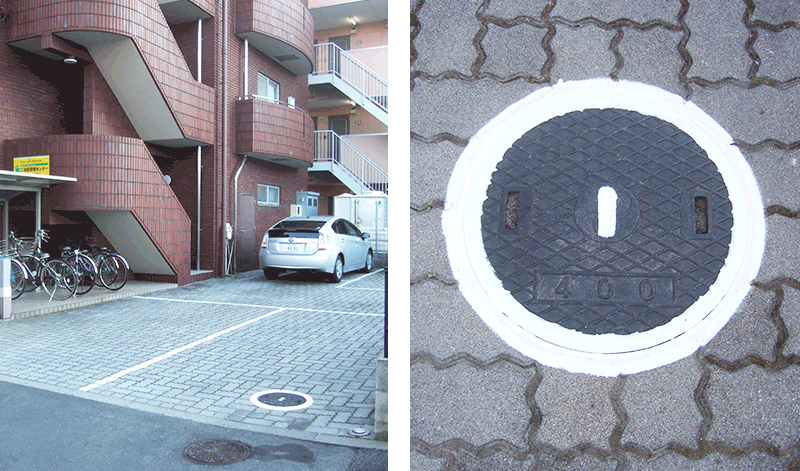 マンホールに白丸1が書いてあるスペースへ駐車してください。